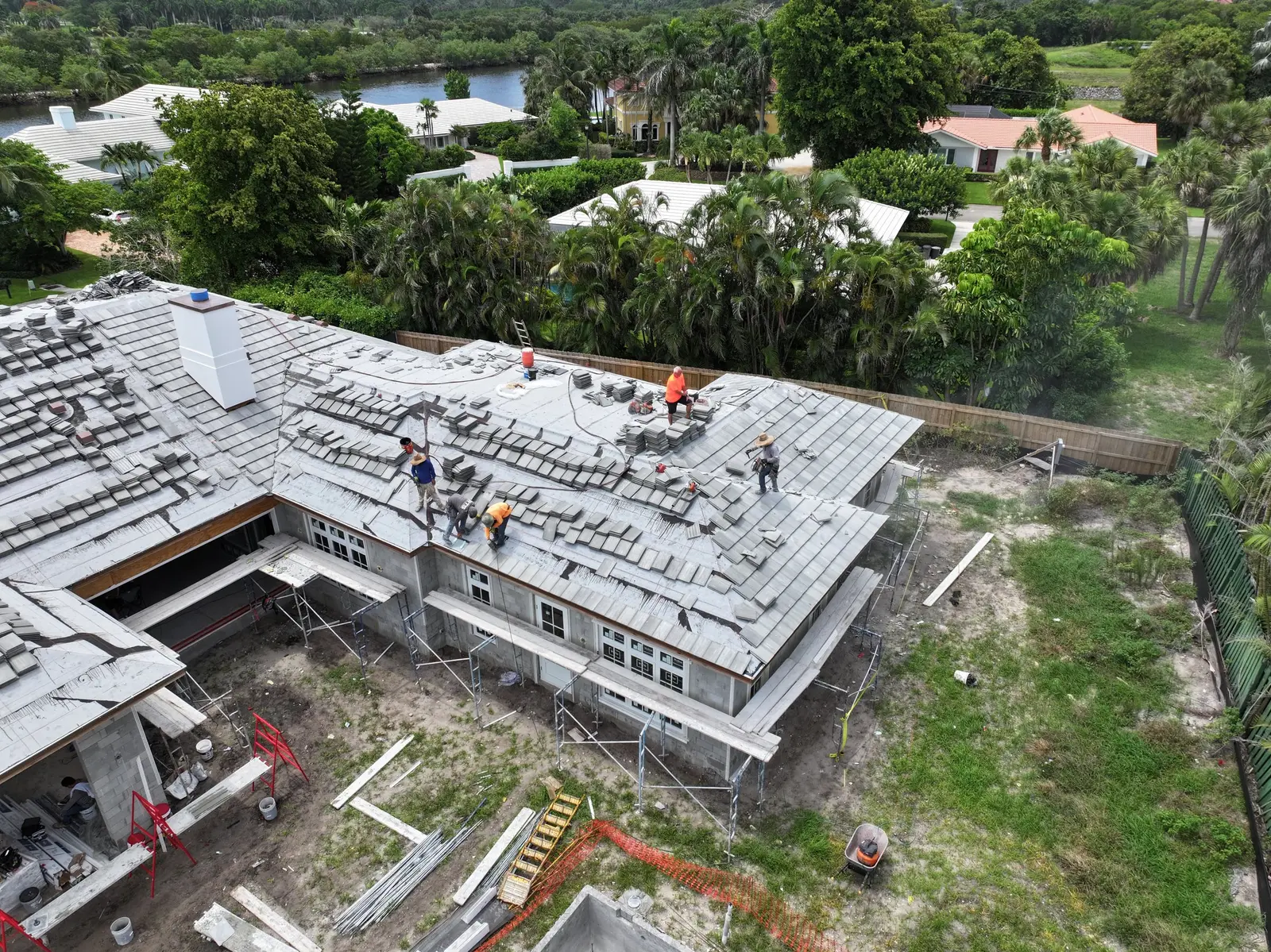 Millennium Makeover crew installing tile on a residential roof
