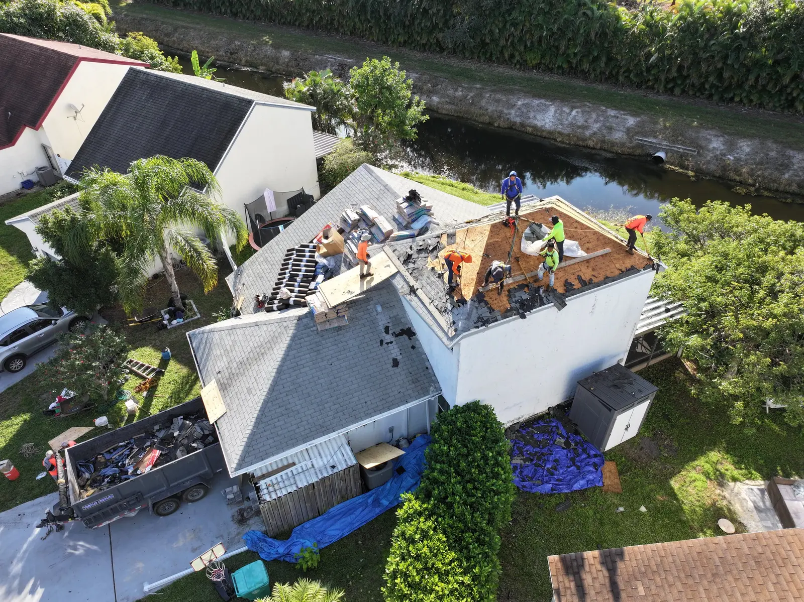 Millennium Makeover crew working on a residential roof