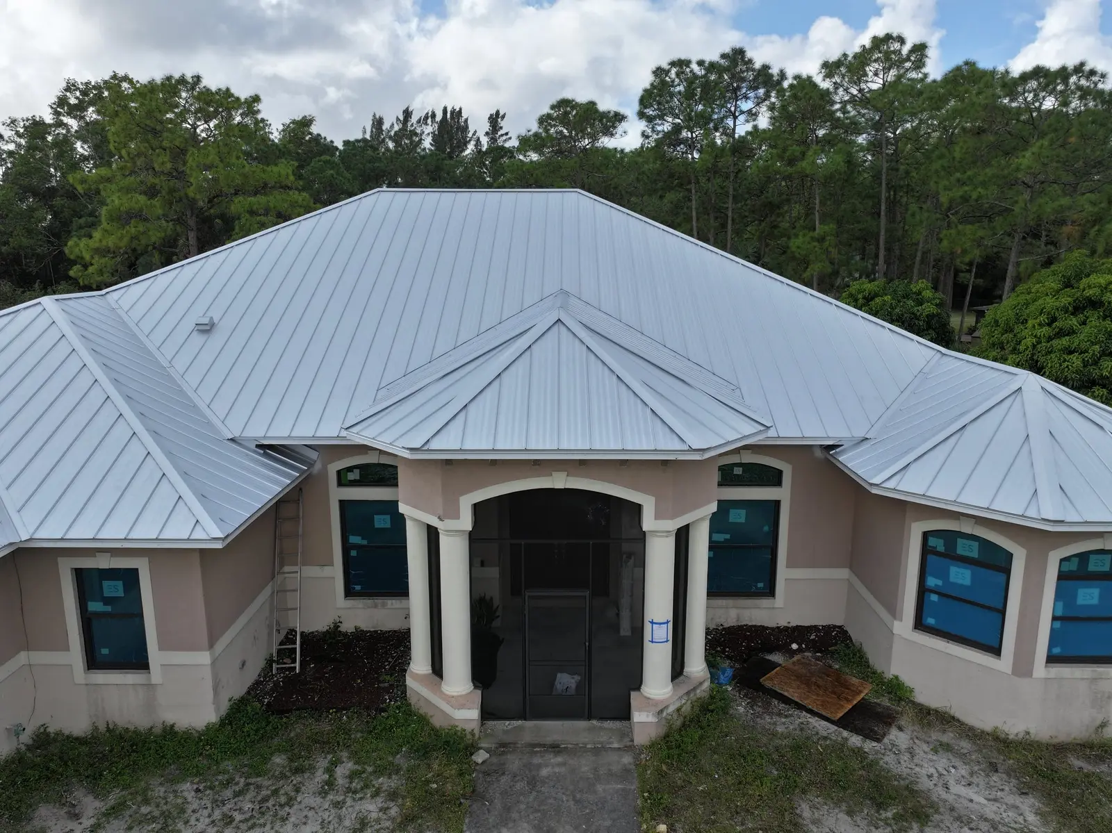 Standing seam metal roof on a South Florida home by Millennium Makeover