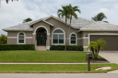 Typical private home at an affluent residential area on Marco Island, Florida.
